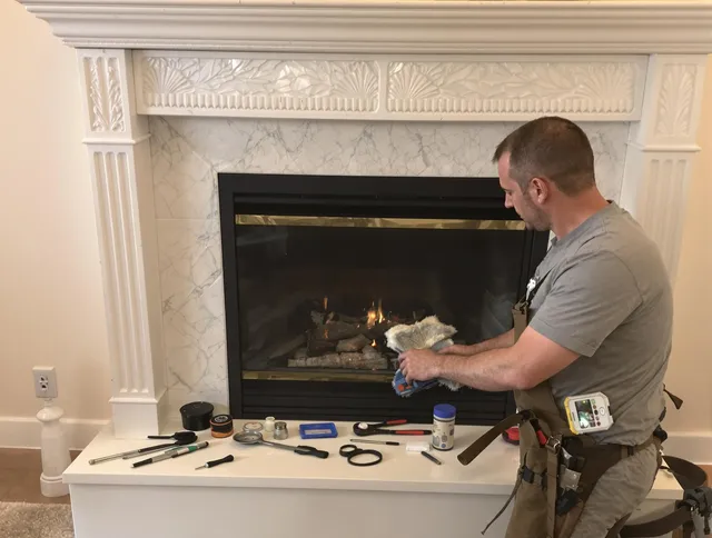 Spring Hill Chimney Sweep performing fireplace maintenance in Spring Hill, FL
